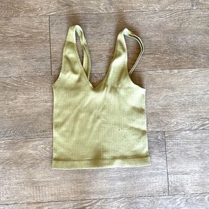 Green tank top. Longer fit/ full length.
